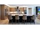 Kitchen featuring marble countertops, stainless steel appliances, and custom cabinetry at 19745 N Mountain Sage Ln, Surprise, AZ 85374