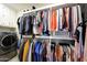 Spacious walk-in closet with custom shelving and plenty of storage for all your attire at 19745 N Mountain Sage Ln, Surprise, AZ 85374
