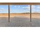 Covered patio with desert views; seamless outdoor living and privacy at 28848 W Grand Ave, Wittmann, AZ 85361