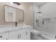Bathroom featuring a marble vanity, frameless shower, and modern fixtures at 28848 W Grand Ave, Wittmann, AZ 85361