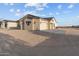 Stylish single-story home boasting attached garage, gravel landscaping, and modern design at 28848 W Grand Ave, Wittmann, AZ 85361