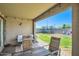 Covered patio area perfect for outdoor dining and relaxing with views of the backyard at 2955 E Flossmoor Ave, Mesa, AZ 85204