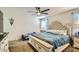 Bedroom showcasing a large bed and window at 2955 E Flossmoor Ave, Mesa, AZ 85204