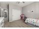 ' bedroom with carpet flooring, closet, and view of the hallway at 3006 E Lexington Ave, Gilbert, AZ 85234