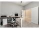 Well-lit home office with modern desk, office chair, and neutral color palette at 3006 E Lexington Ave, Gilbert, AZ 85234