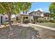 Inviting two-story home with a charming front yard and walkway at 3036 N Acacia Way, Buckeye, AZ 85396