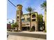 Exterior view of a commercial building featuring two popular restaurants and multiple balconies and awnings at 3036 N Acacia Way, Buckeye, AZ 85396