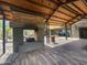 Inviting outdoor lounge area with brick fireplace and seating, perfect for relaxing and socializing at 3036 N Acacia Way, Buckeye, AZ 85396