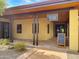 Inviting entrance to the community spa, featuring modern architecture, signage, and a welcoming atmosphere at 3036 N Acacia Way, Buckeye, AZ 85396