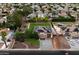 Neighborhood aerial view showcasing the home's landscaping, lawn, and location within the community at 3944 W Paradise Ln, Phoenix, AZ 85053