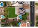 Aerial view of a home featuring solar panels, a pool, and an expansive lawn at 3944 W Paradise Ln, Phoenix, AZ 85053