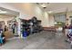 Large garage with shelving and a partial ramp for recreational vehicles at 3944 W Paradise Ln, Phoenix, AZ 85053
