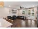 Cozy living room with hardwood floors, comfortable seating, and french doors leading to the outdoors at 3944 W Paradise Ln, Phoenix, AZ 85053