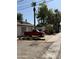 This property offers a backyard and two red trucks at 404 W 11Th St, Tempe, AZ 85281