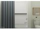Clean bathroom featuring a shower/tub combo with tiled walls and modern fixtures at 4707 E French Rd, San Tan Valley, AZ 85143