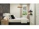 Bright bedroom with patterned wallpaper, bedside tables, and window with natural light at 4707 E French Rd, San Tan Valley, AZ 85143