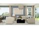 Bright living room features a neutral color palette, stylish decor, and plenty of natural light at 4707 E French Rd, San Tan Valley, AZ 85143