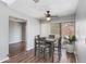 Inviting dining area with a ceiling fan and sliding glass doors to bring natural light at 4772 W Joshua Blvd, Chandler, AZ 85226