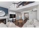 Stylish living room features a fireplace, high ceilings, modern furnishings, and an open, airy layout at 4772 W Joshua Blvd, Chandler, AZ 85226