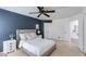 This spacious main bedroom has neutral carpet and a lovely ensuite bathroom at 4772 W Joshua Blvd, Chandler, AZ 85226