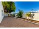 Low-maintenance backyard showcasing a private and serene outdoor space with desert landscaping at 507 W Sweetwater Ave, Phoenix, AZ 85029