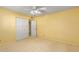Bright bedroom with ceiling fan, neutral carpet, and built-in closet provides a calming retreat at 507 W Sweetwater Ave, Phoenix, AZ 85029