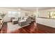 Bright and open living room flows into the dining area for easy entertaining at 507 W Sweetwater Ave, Phoenix, AZ 85029