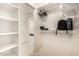 Walk-in closet with built-in shelving and hanging racks at 507 W Sweetwater Ave, Phoenix, AZ 85029