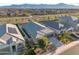 Overhead shot of a neighborhood showcasing homes with desert landscaping and mountain views at 5345 W Alta Mesa Ave, Laveen, AZ 85339
