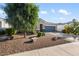 Single story home with low maintenance landscaping and a two car garage at 5345 W Alta Mesa Ave, Laveen, AZ 85339