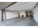 Bright and spacious garage offering plenty of room for parking and storage, accessible via a modern door at 5345 W Alta Mesa Ave, Laveen, AZ 85339