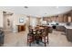 Open layout featuring kitchen, dining area, and convenient access to a chef-inspired cooking experience at 5345 W Alta Mesa Ave, Laveen, AZ 85339