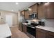 Stylish kitchen featuring stainless steel appliances and sleek countertops at 5345 W Alta Mesa Ave, Laveen, AZ 85339