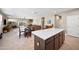 Open living space features an inviting flow from kitchen to living room at 5345 W Alta Mesa Ave, Laveen, AZ 85339
