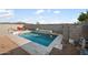 Backyard pool oasis with stylish lounge area, perfect for relaxation and outdoor entertainment in a private setting at 5345 W Alta Mesa Ave, Laveen, AZ 85339