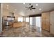 Open kitchen with stainless steel appliances, large island, and ample cabinet space at 6023 E Scafell Cir, Mesa, AZ 85215