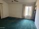 Bedroom featuring neutral-toned walls, one standard window and standard curtains at 6320 W Del Mar Ln, Glendale, AZ 85306