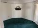 Dining room with hanging light fixture, neutral walls and standard window at 6320 W Del Mar Ln, Glendale, AZ 85306