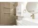 Contemporary bathroom featuring a walk-in shower, unique sink with gold fixtures, and modern vanity at 6813 E Diamond St, Scottsdale, AZ 85257