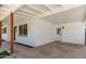 Carport offers shelter with white painted brick, a convenient entrance, and manicured landscaping at 6813 E Diamond St, Scottsdale, AZ 85257