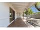 Covered patio area showcases neutral tile flooring and provides a relaxing outdoor living space at 6813 E Diamond St, Scottsdale, AZ 85257