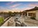 Beautiful backyard showcasing a pool, spa, fire pit, and comfortable seating areas with mature landscaping at 7315 E Brisa Dr, Scottsdale, AZ 85266