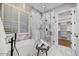 Stunning bathroom featuring marble shower, soaking tub, and walk-in closet at 7315 E Brisa Dr, Scottsdale, AZ 85266
