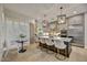 Bright, spacious kitchen with a large island, stainless steel appliances, modern pendant lighting, and custom cabinetry at 7315 E Brisa Dr, Scottsdale, AZ 85266
