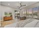 Bright primary bedroom with natural light, hardwood floors, and a walk out to the patio at 7315 E Brisa Dr, Scottsdale, AZ 85266
