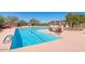 Large swimming pool featuring lane markers and lounge areas for relaxing by the water at 7315 E Brisa Dr, Scottsdale, AZ 85266
