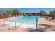 Community pool with fountains and lounge chairs at 7315 E Brisa Dr, Scottsdale, AZ 85266