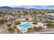 Beautiful community pool with lounge areas, perfect for relaxation and recreation with stunning mountain views at 7722 E Wolf Canyon St, Mesa, AZ 85207