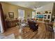 Living room with wood floors and lots of natural light from the many windows at 7722 E Wolf Canyon St, Mesa, AZ 85207