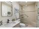 Modern bathroom featuring a glass walk-in shower, sleek fixtures, and a quartz countertop vanity with contemporary matte black faucet at 7955 E Chaparral Rd # 129, Scottsdale, AZ 85250